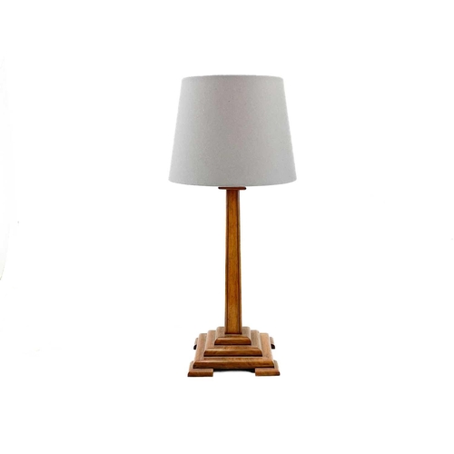 287 - A 1930s stained beech and ebonised table lamp. Height 35cm, together with a walnut square tapered ta... 