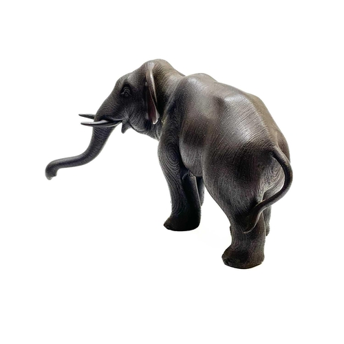 288 - A Japanese bronze elephant Meiji period. Height 15cm.