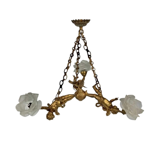 291 - A gilt metal hanging electrolier. Early 20th century, with three winged cherubs each supporting a pe... 