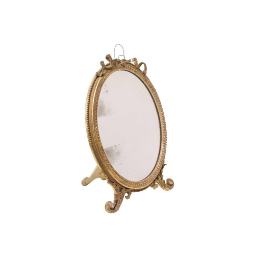 292 - A 19th century gilt gesso oval table mirror. Height 61cm.