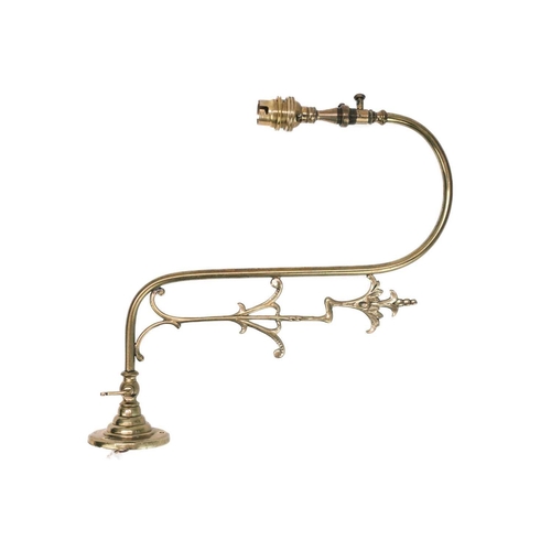 303 - A pair of brass swan neck wall lights. Height 43cm, and another similar (3).