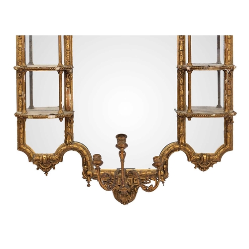 308 - A late Victorian gilt gesso girandole wall mirror. The central plate flanked by shaped shelves, with... 