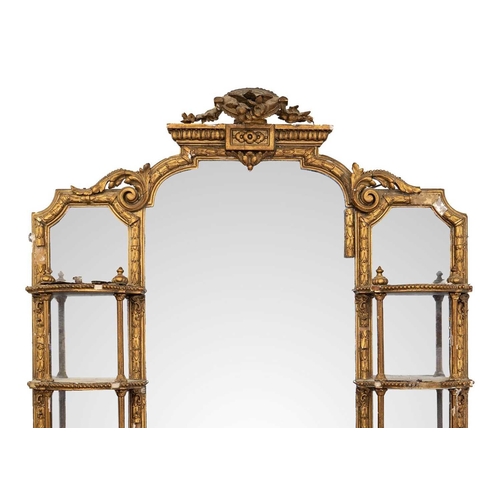 308 - A late Victorian gilt gesso girandole wall mirror. The central plate flanked by shaped shelves, with... 