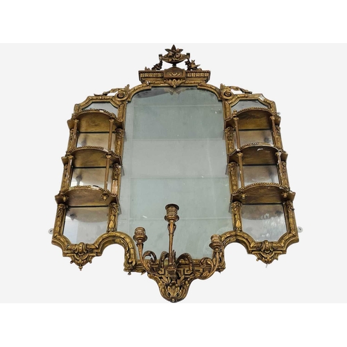 308 - A late Victorian gilt gesso girandole wall mirror. The central plate flanked by shaped shelves, with... 