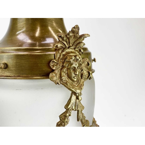 326 - An early 20th century French brass lantern. With floral swags and mask decoration etched frosted gla... 