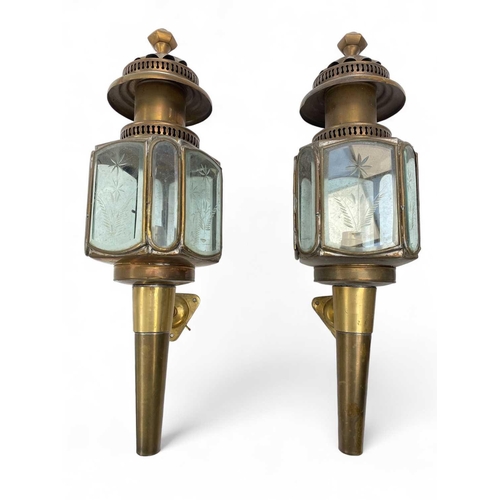 339 - Brass carriage lanterns Wired for electricity, with opening etched glass panels, wall fixing bracket... 