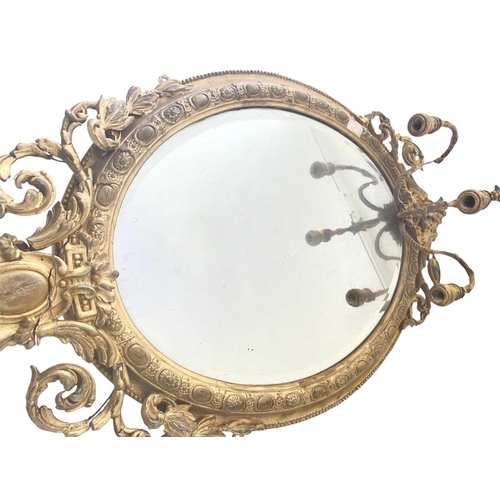 342 - A 19th century gesso gilt girandole mirror. With foliate scrolls, height 94cm width 56cm.