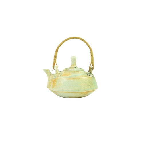 373 - Mary Rich (1940) miniature porcelain teapot and cover. Wicker handle, impressed mark to base, height... 