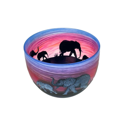 386 - Malcolm Sutcliffe (1954). A studio glass bowl, deeply etched with silhouettes of an elephant family ... 