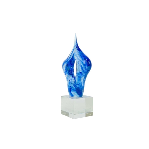 404 - A blue Murano type abstract glass sculpture. On a square glass plinth, height 35cm. There is no appa... 