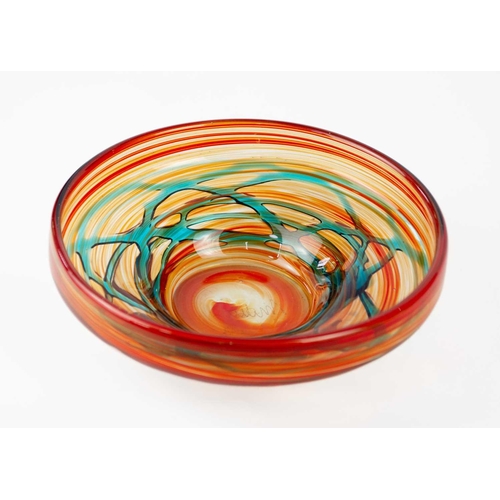 406 - A collection of Maltese glassware. An orange and blue swirl design Mdina bowl (20cm in diameter), wi... 