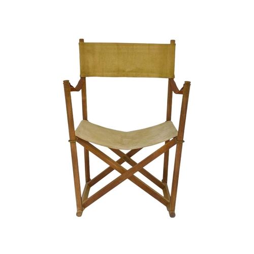 426 - A Danish teak and canvas Mogens Koch folding directors chair Brass label, height 89cm.