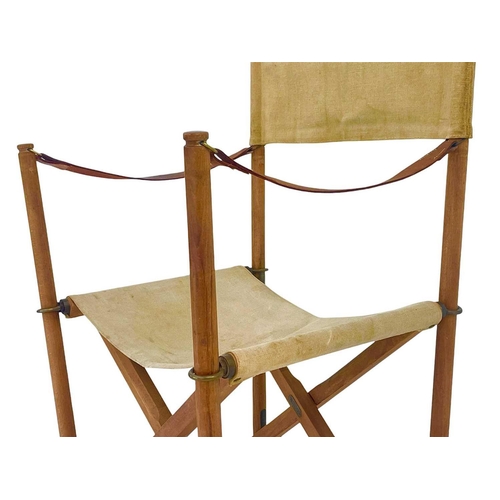 426 - A Danish teak and canvas Mogens Koch folding directors chair Brass label, height 89cm.