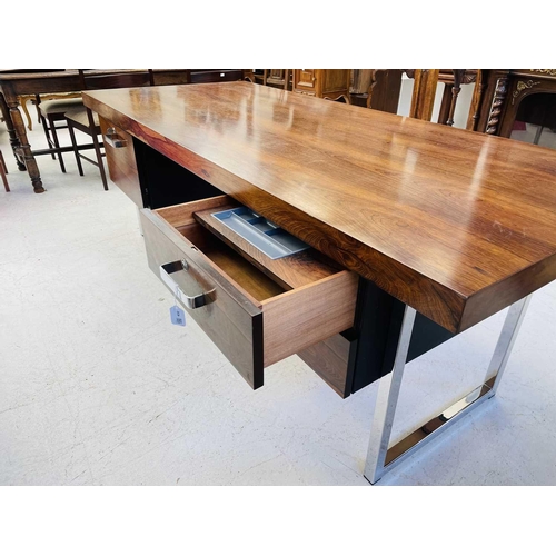 432 - A Ray Leigh and Trevor Chinn desk manufactured by Gordon Russell. Indian rosewood veneer, chrome and... 