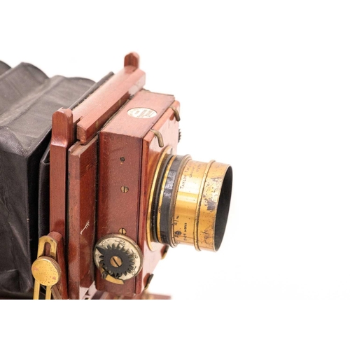 501 - A Thornton Picard plate camera and tripod. Taylor Taylor & Hobson series III lens.