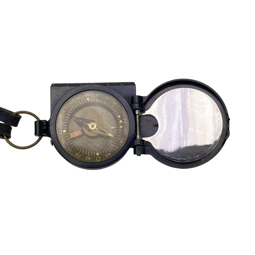 508 - A Francis Baker M88 prismatic compass. With a certificate together with a German Bakelite FPM handko... 