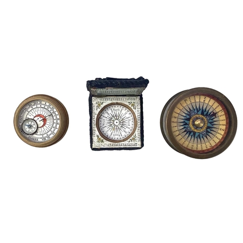 509 - A collection of various compasses. Including a Pocket Compass and Sundial in a turned boxwood box. (... 