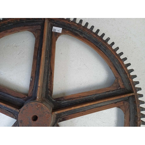 51 - A large painted wood and pine cog pattern. Stamped number 364, diameter 83cm.