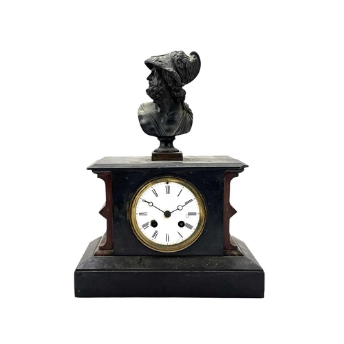 519 - A French rouge marble and black slate mantel clock. Surmounted by a bronze bust of the Greek warrior... 