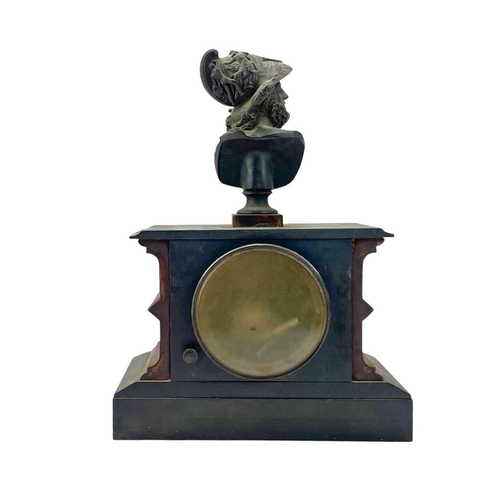 519 - A French rouge marble and black slate mantel clock. Surmounted by a bronze bust of the Greek warrior... 