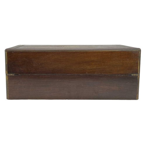 52 - A Victorian brass inlaid mahogany writing box. With a fitted interior and three concealed drawers, h... 