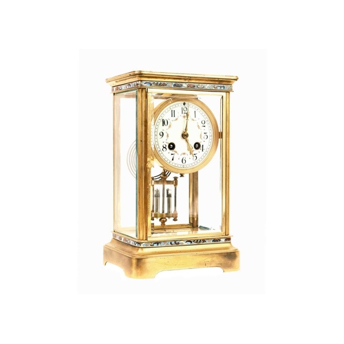 520 - A French four-glass gilt metal mantel clock. Late 19th century, the circular dial with enamelled flo... 