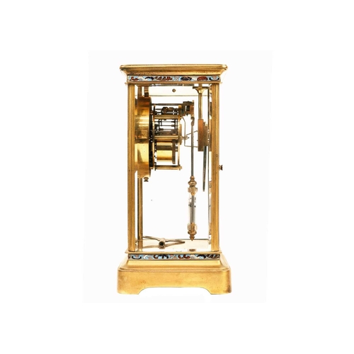 520 - A French four-glass gilt metal mantel clock. Late 19th century, the circular dial with enamelled flo... 