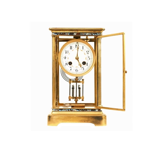 520 - A French four-glass gilt metal mantel clock. Late 19th century, the circular dial with enamelled flo... 