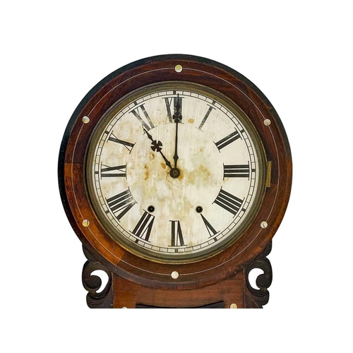 521 - A 19th century rosewood and mother of pearl inlaid wall clock. With leaf and scroll carved sides, he... 