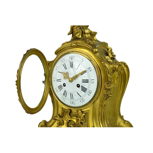 527 - A French ormolu mantel clock by Jacques Caffieiri 18th century, the rococo case inscribed 'Fait Par ... 