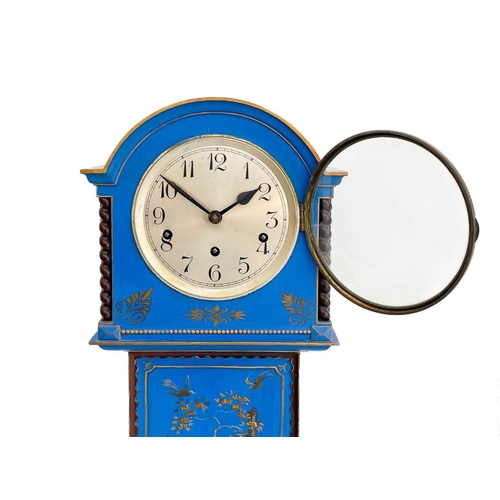 529 - A Chinoiserie lacquer small longcase or 'Grandmother' clock. With raised gilded decoration on a blue... 