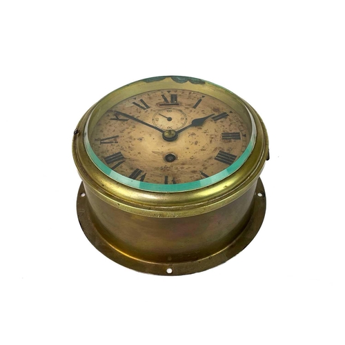 531 - A Smiths brass ship's bulkhead clock. Diameter 18cm, together with a Short & Mason compensated anero... 