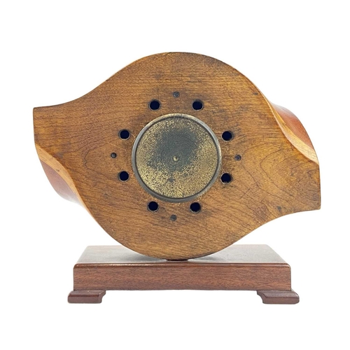 532 - A laminated wooden propeller mantle clock. The central hub with inset Swiss made movement, height 26... 