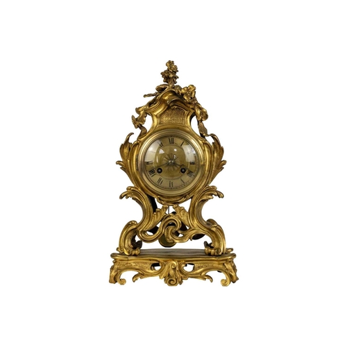 535 - A French ormolu rococo revival mantel clock, 19th century. The movement stamped Lons Paris, with sil... 