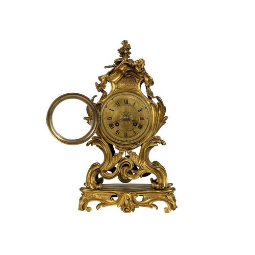 535 - A French ormolu rococo revival mantel clock, 19th century. The movement stamped Lons Paris, with sil... 