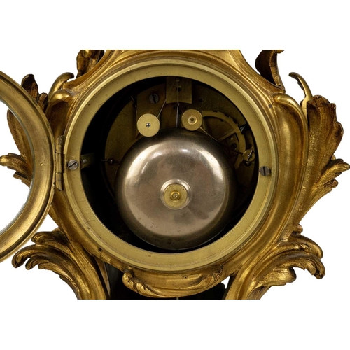 535 - A French ormolu rococo revival mantel clock, 19th century. The movement stamped Lons Paris, with sil... 