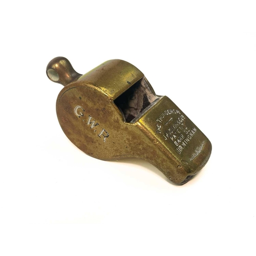 538 - A G.W.R. Hudson & Co brass Thunderer whistle. Stamped P.Way 10542, together with three G.W.R. button... 