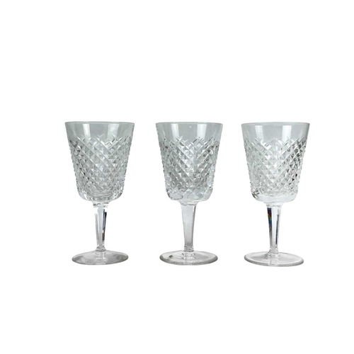 553 - A Waterford Crystal Alana pattern part suite. Comprising: six tumblers, six hock, three claret and f... 