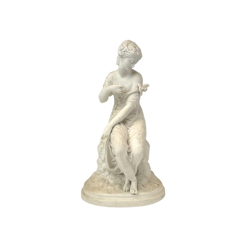 557 - An English Parian figure of a maiden. Height 33cm together with another English Parian figure group.... 