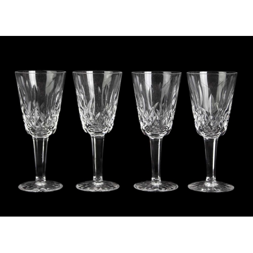 560 - Waterford Crystal Part Suite. Lismore pattern, comprising: four Hock glasses, four claret glasses, t... 