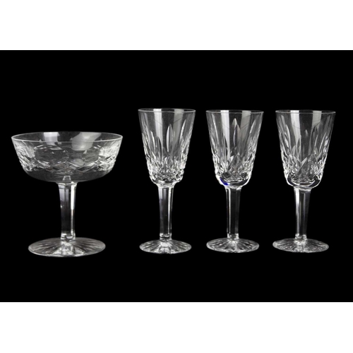 560 - Waterford Crystal Part Suite. Lismore pattern, comprising: four Hock glasses, four claret glasses, t... 