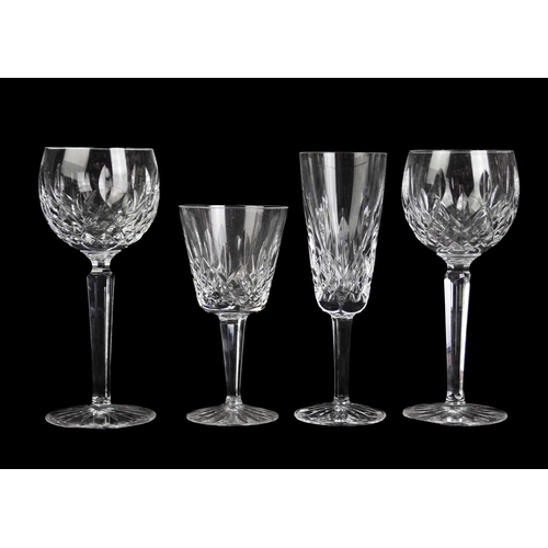 560 - Waterford Crystal Part Suite. Lismore pattern, comprising: four Hock glasses, four claret glasses, t... 