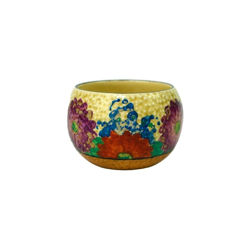 562 - A Clarice Cliff Gayday pattern small bowl. Height 4.8cm, together with a Poole small dish, diameter ... 