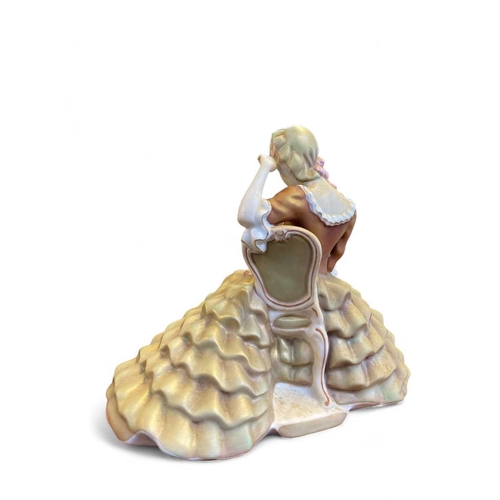 571 - A Royal Dux porcelain figure of a Lady reading a book. Height 26cm together a copy of Royal Dux Pass... 