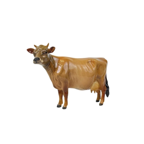 588 - A Beswick Pottery Fresian cow CH Leegwater. Together with Jersey cow CH Newton Tinkle, Charolais cow... 