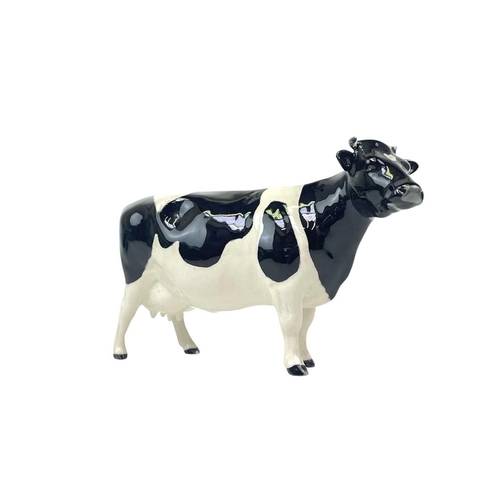 588 - A Beswick Pottery Fresian cow CH Leegwater. Together with Jersey cow CH Newton Tinkle, Charolais cow... 