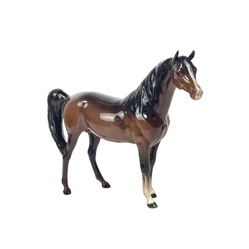 592 - A Beswick matt glaze CH Burnham Beauty. Height 27cm together with a Beswick gloss glaze Shire horse,... 