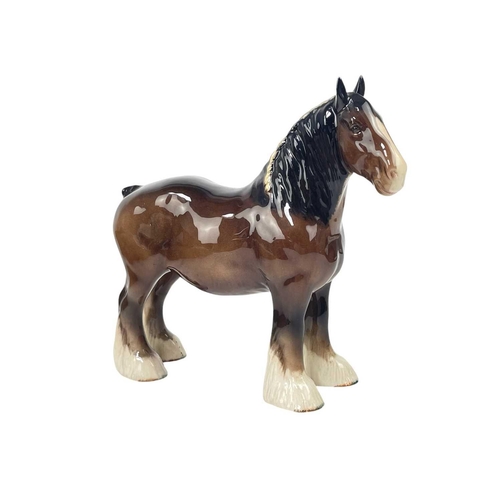 592 - A Beswick matt glaze CH Burnham Beauty. Height 27cm together with a Beswick gloss glaze Shire horse,... 