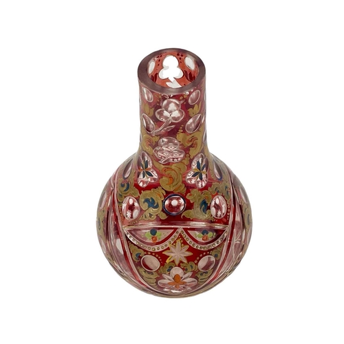 599 - A 19th century Bohemian ruby flash glass vase Highlighted with overpaint height 24cm. The rim has be... 