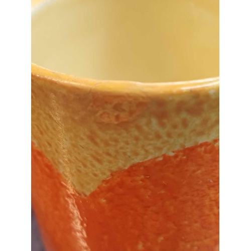 619 - A Clarice Cliff Oranges Cafe au Lait pattern drum shape preserve pot and cover. Bizarre Wilkinson an... 